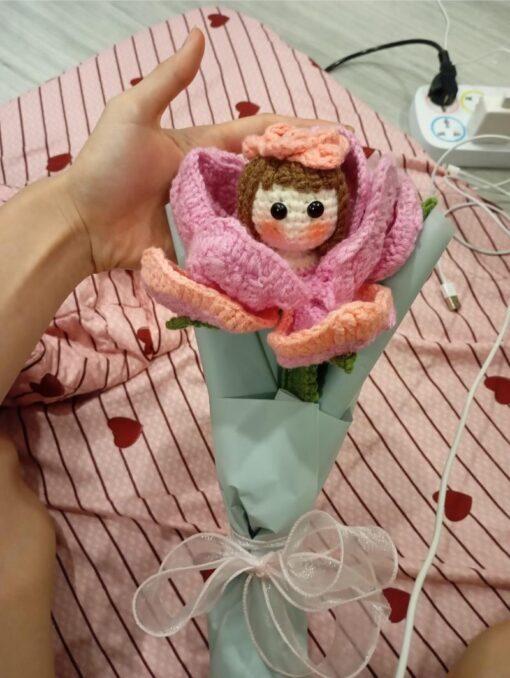 Bouquet of Crocheted Flowers Designed With a Little Girl in the Center of the Petals