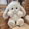 Cute Stuffed Rabbit With Bow Tie Around Neck