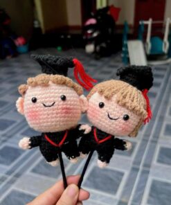 Ornament With Boy and Girl in Graduation Attire Design