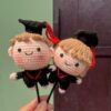 Ornament With Boy and Girl in Graduation Attire Design